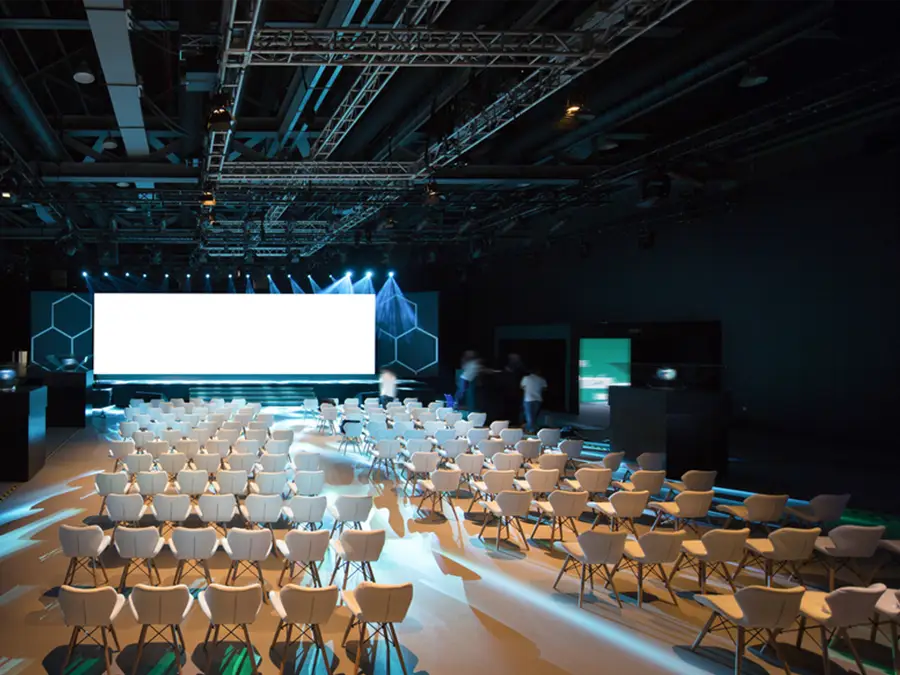 Corporate Event Chairs and Big Screen with Lighting